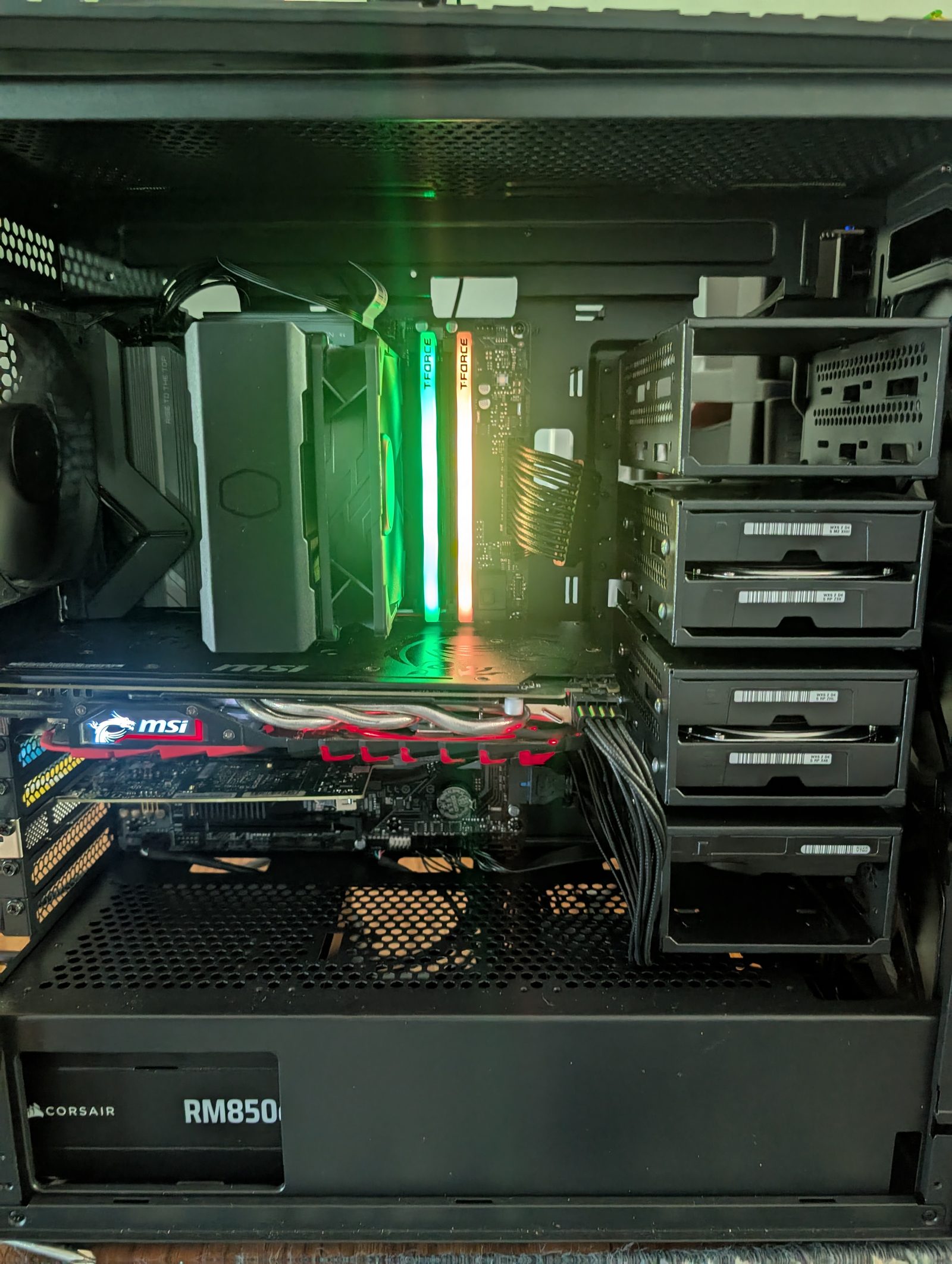 12-bay NAS storage tower with motherboard, RAM, and drive cages built and ready