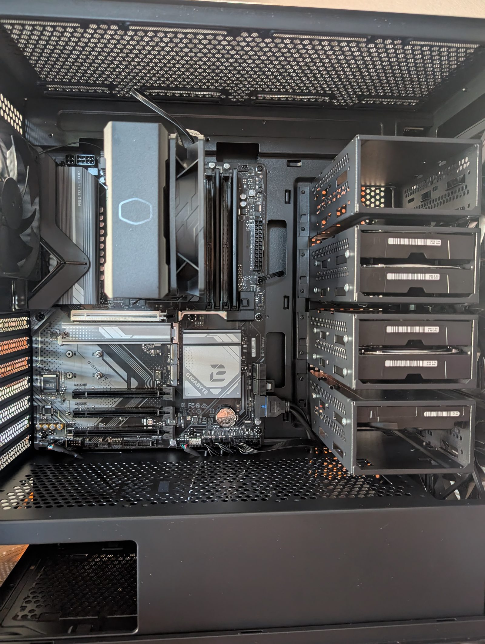 NAS server with RGB-lit memory, GPU, and 850-watt power supply, drives mounted
